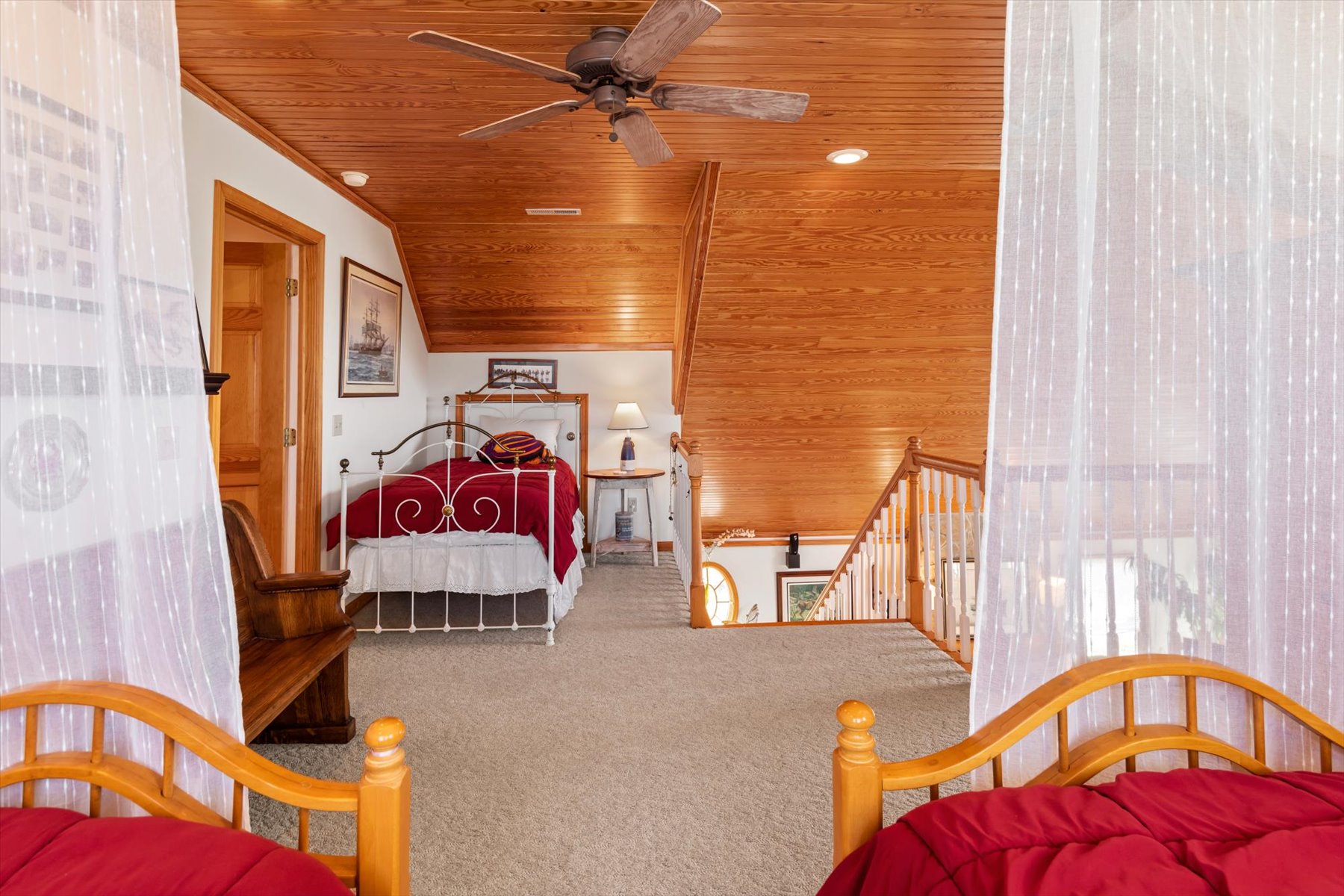 The Open Loft Bedroom has 3 Twin Beds.