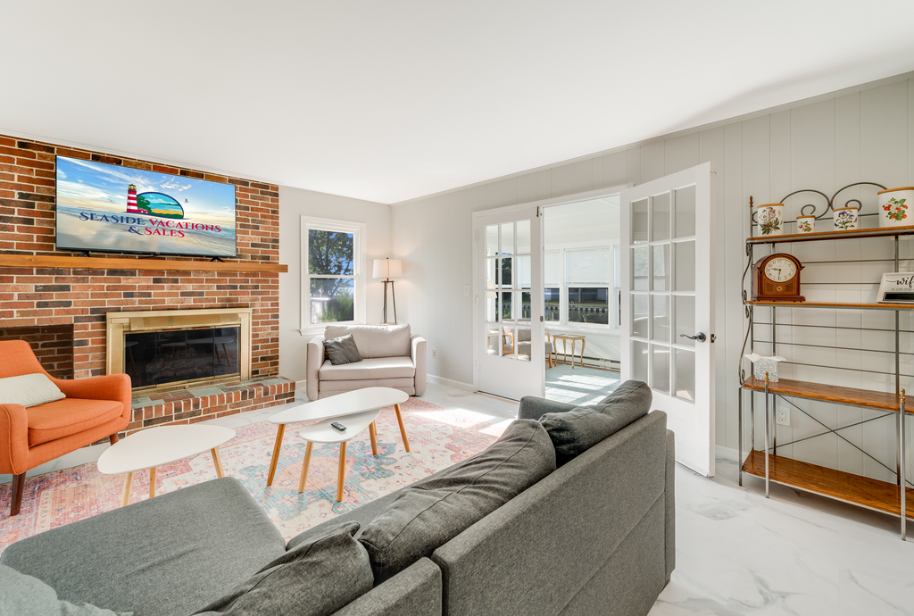 Relax in the Living Area are a fun-filled day at the Beach and enjoy Flat Screen Smart TV.