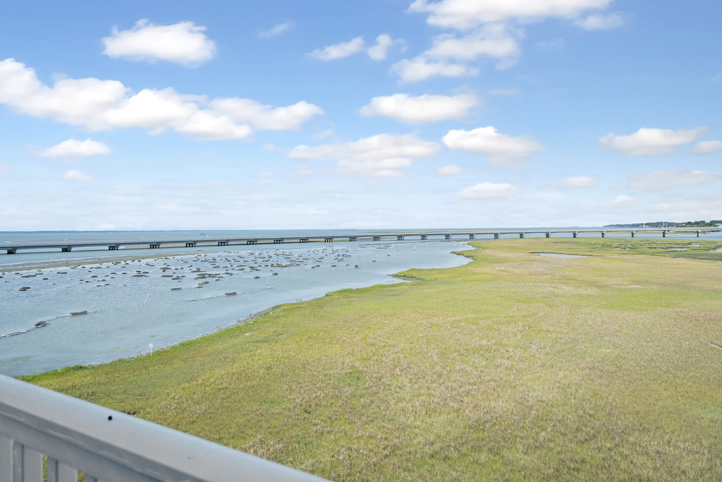 Breathtaking Views of the Bay, Oyster Beds, and Chincoteague Causeway in the distance.