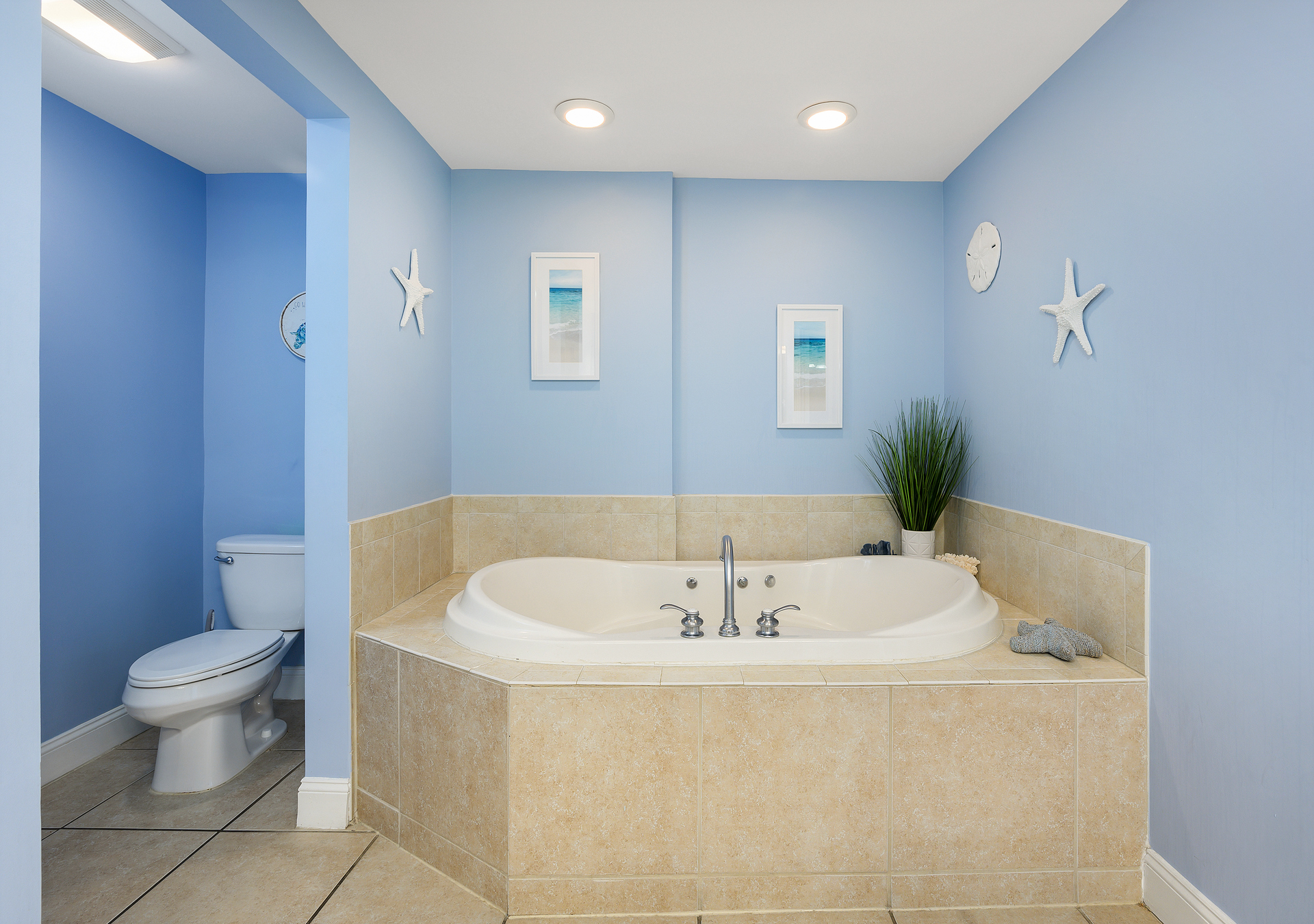 This beautiful Primary Bath offers a soaking tub and a walk-in shower for the ultimate place to rejuvenate