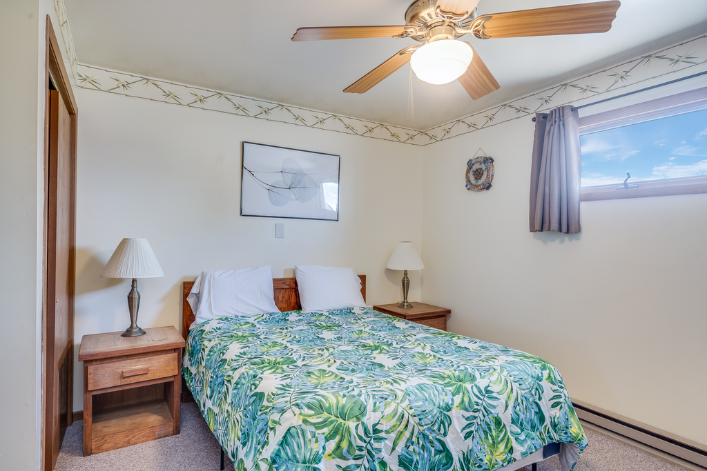 The Main Bedroom has a cozy Queen Bed