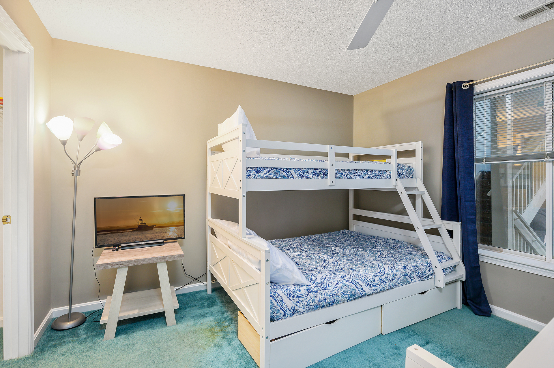 The Pyramid Bunks with Twin over Full along with the Flat screen TV create the perfect space for your little loved ones to relax after a long day