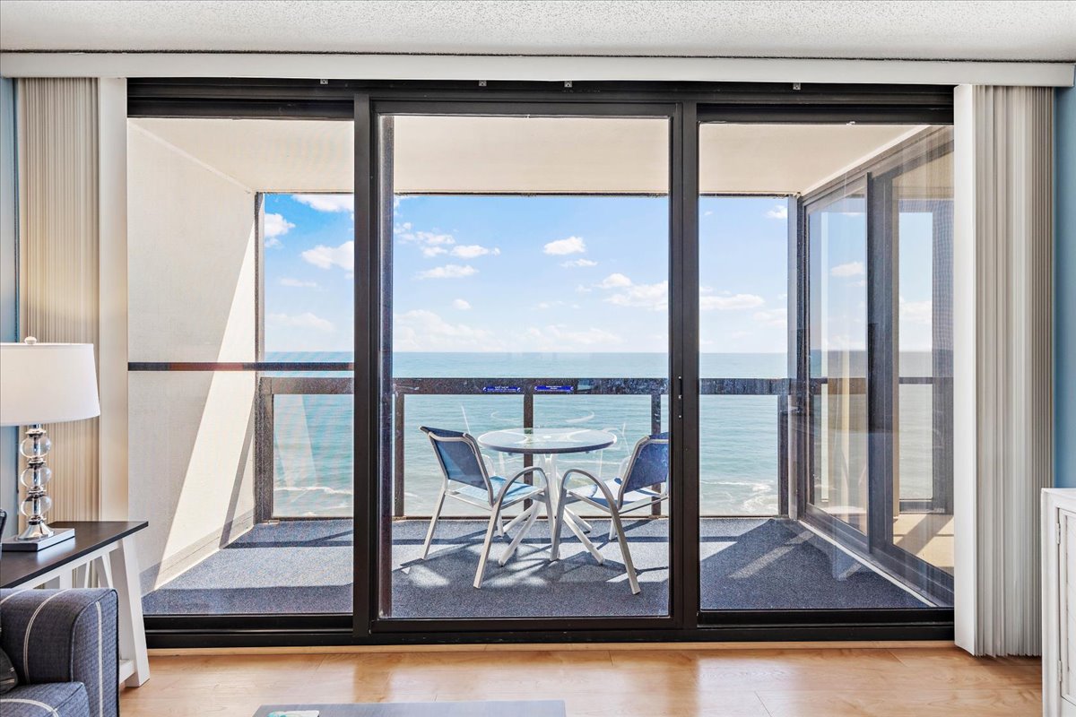 Abundant Natural Lighting Beams right through the Floor to Ceiling Windows!