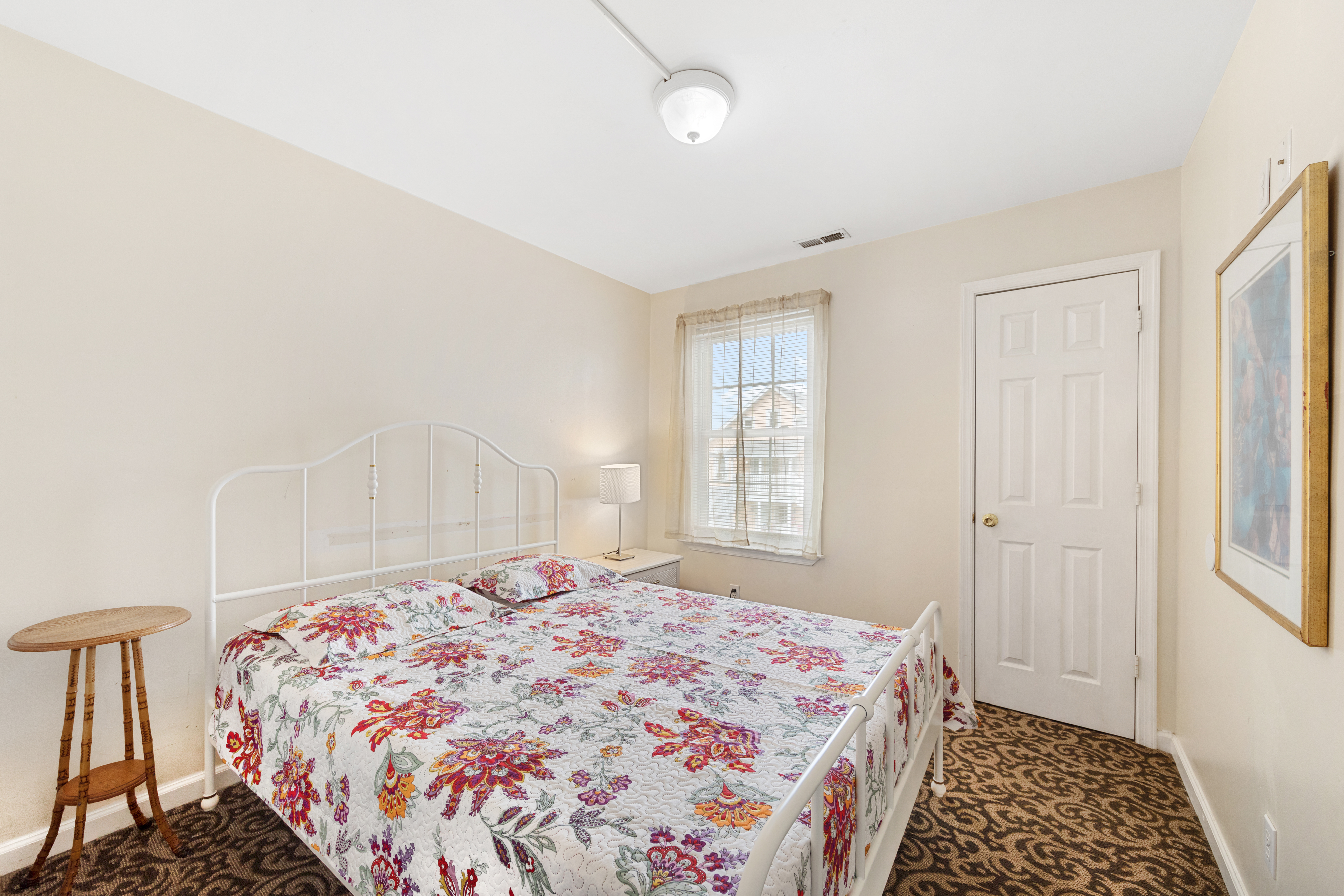 Bedroom 3 offers a queen size bed.