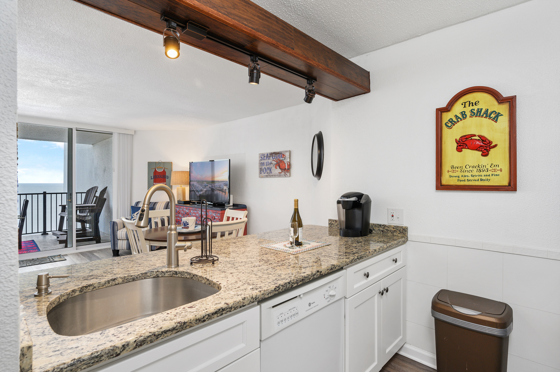 The Kitchen has gorgeous beamed ceilings and granite counters!