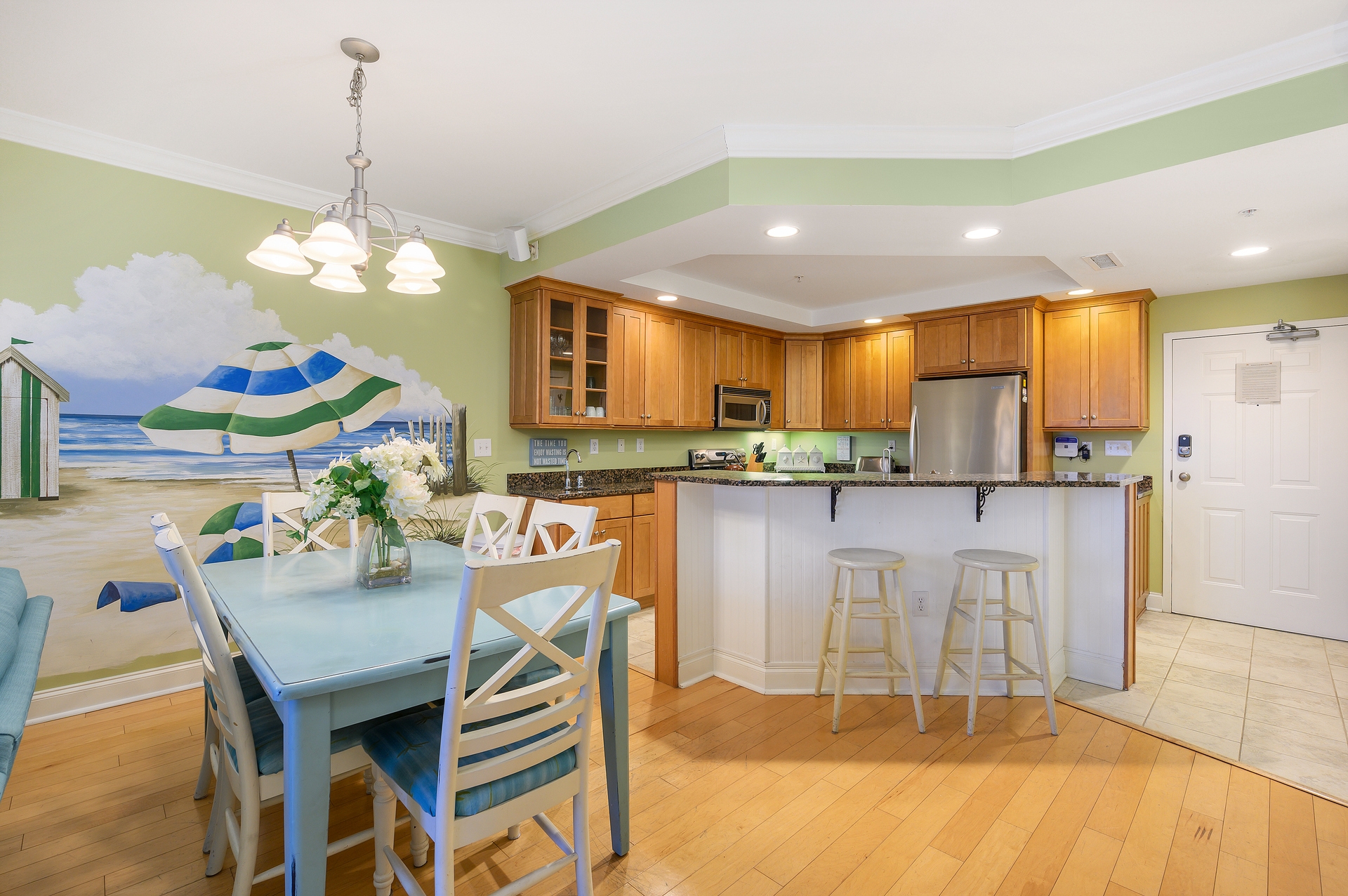 The Hand Painted mural is the perfect background for your Family Meals.