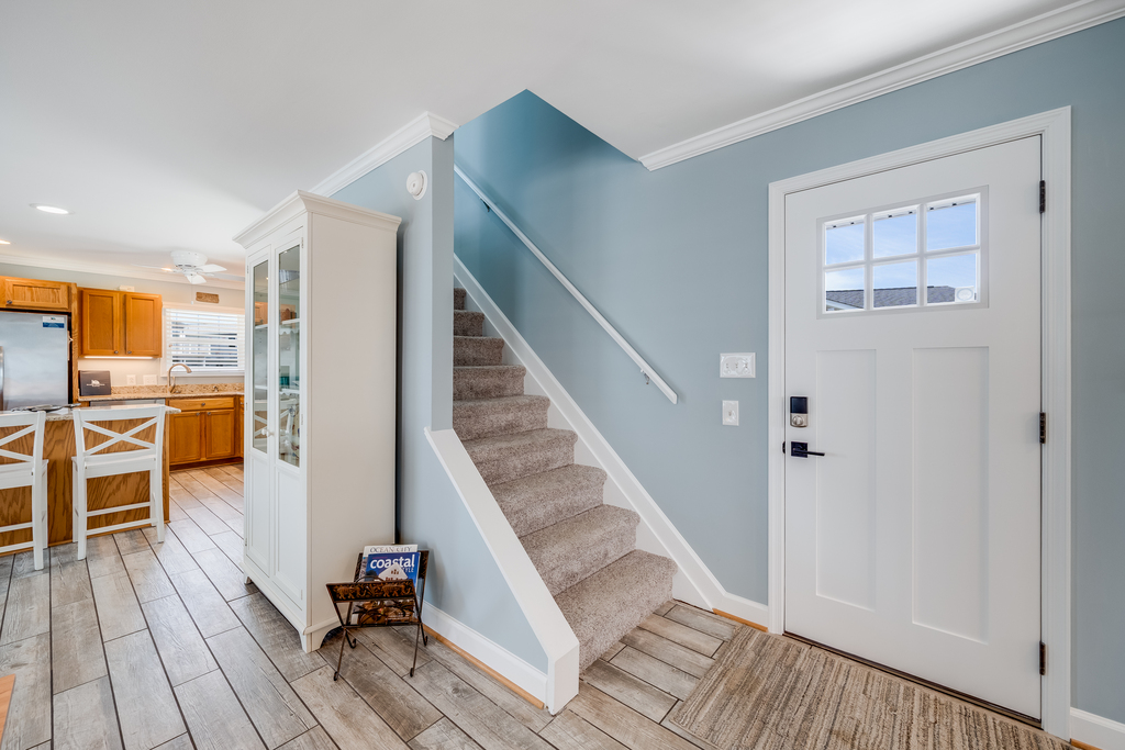 Gorgeous floors reminiscent of the ocean driftwood lead you to the upstairs.