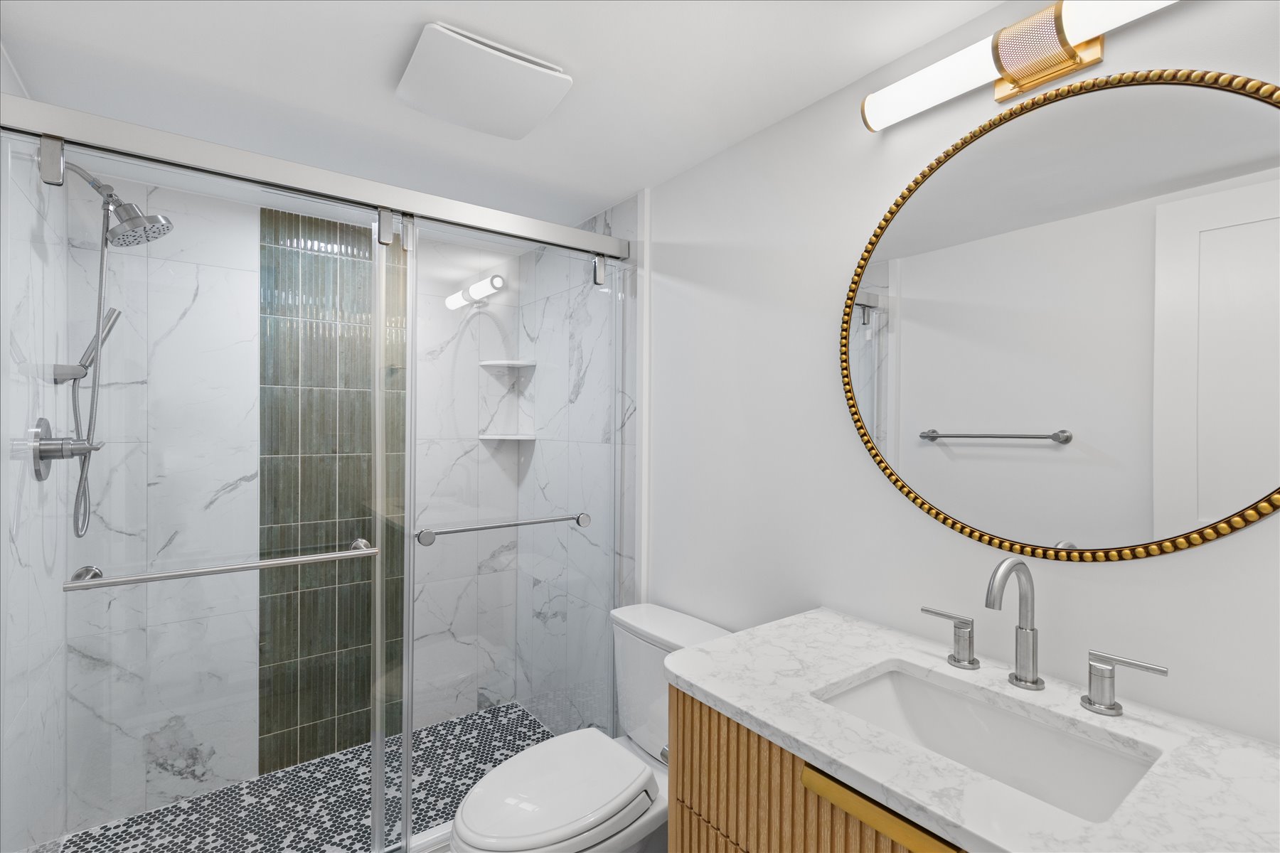 Full bathroom with custom walk-in shower.