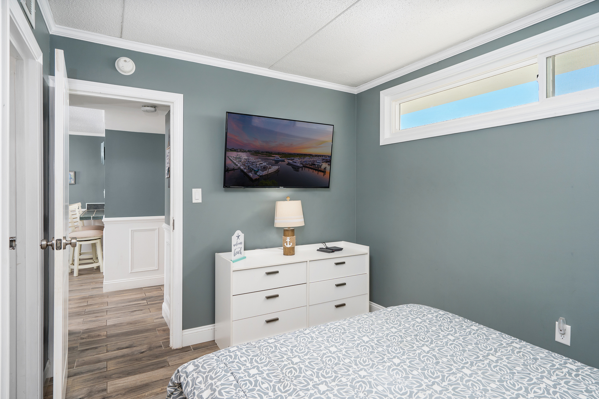 Sink into the Cozy Queen Bed and enjoy the Flat Screen Smart TV.