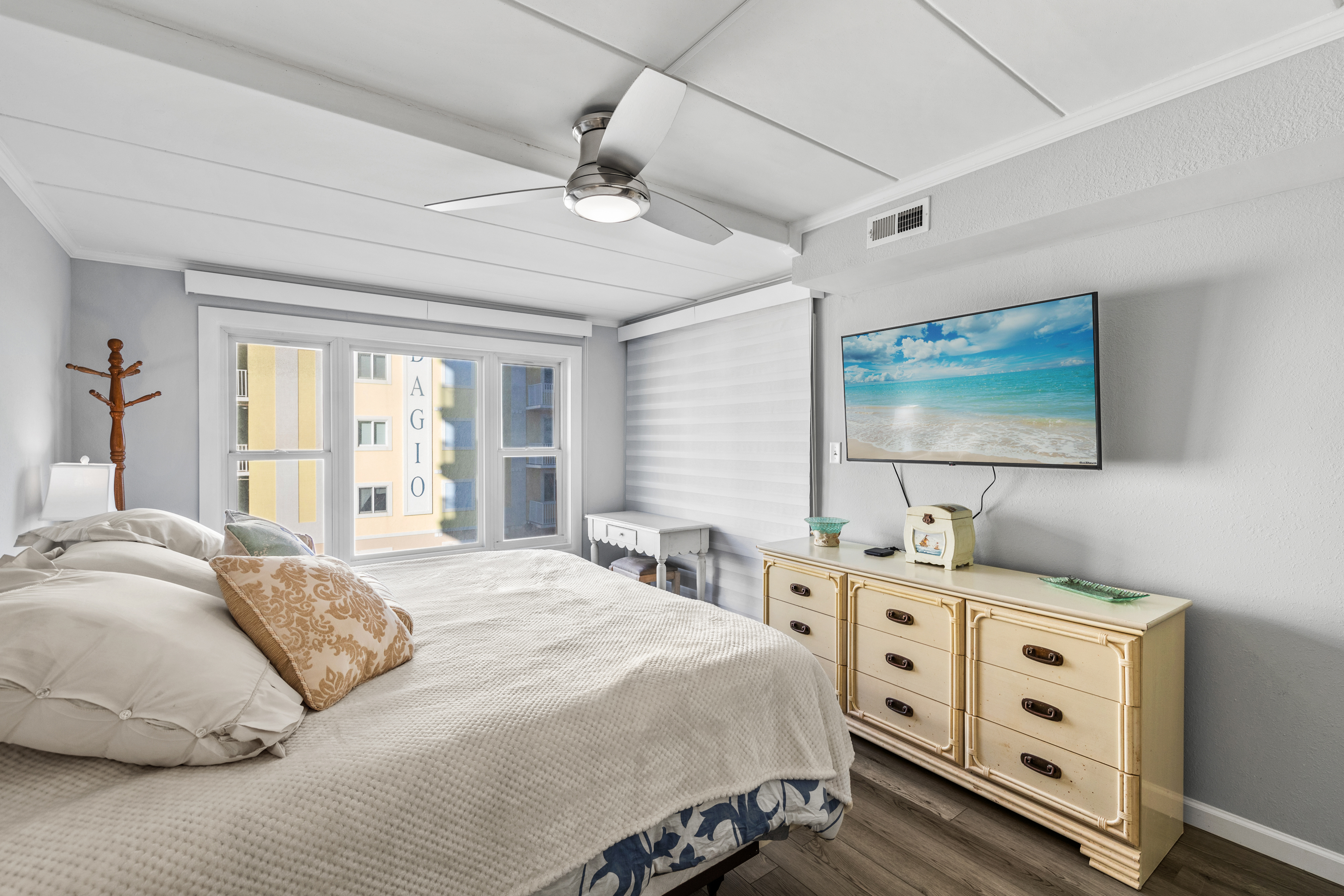 Sink into the cozy bed and enjoy your favorite show on the mounted flat screen.