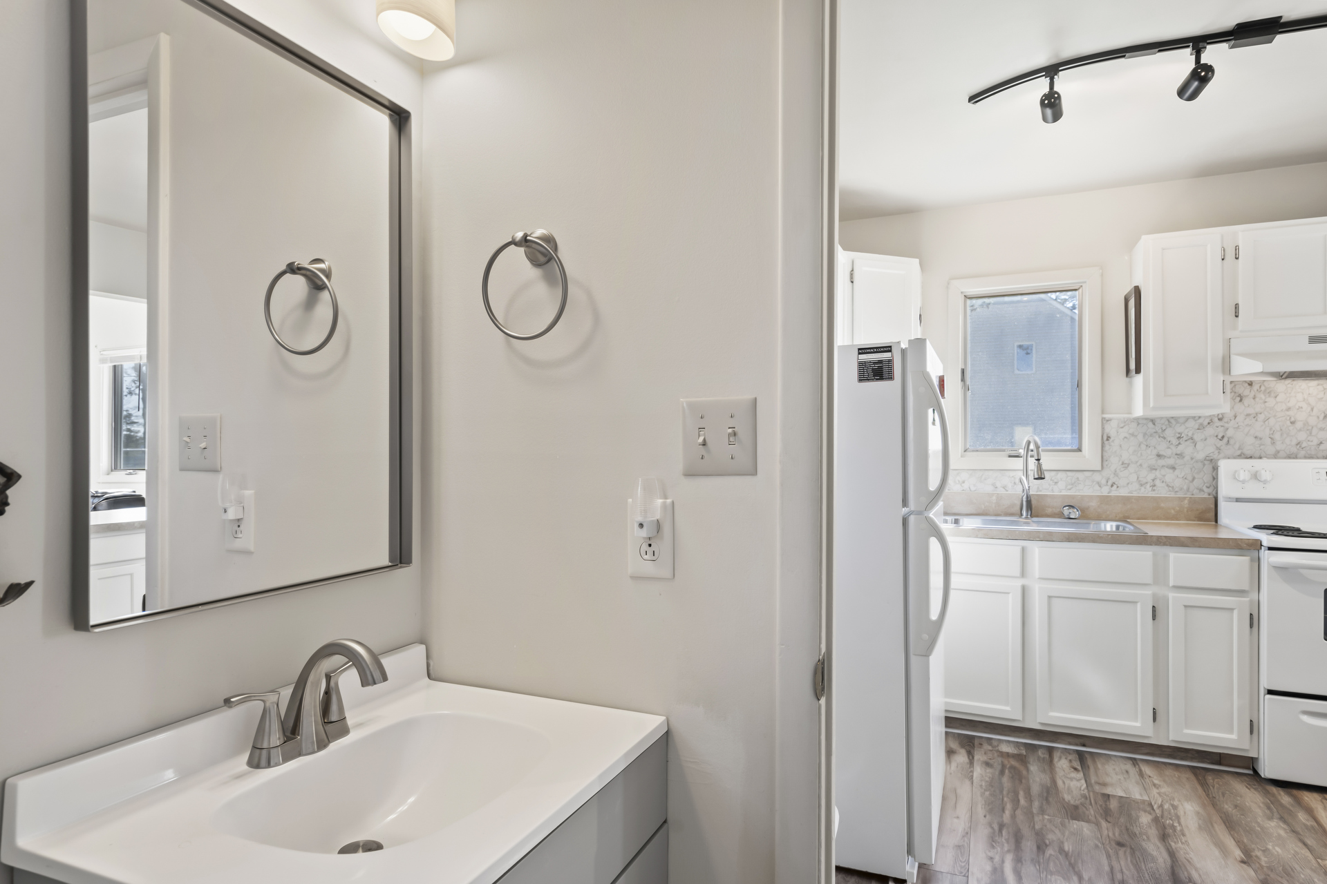 Half Bath is just off Kitchen and Living Area.