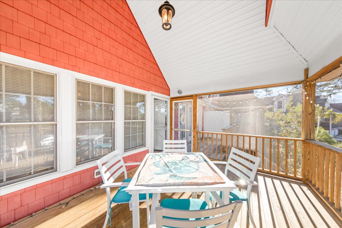 Or dine Al Fresco on the Screened Porch lining the front of the house.