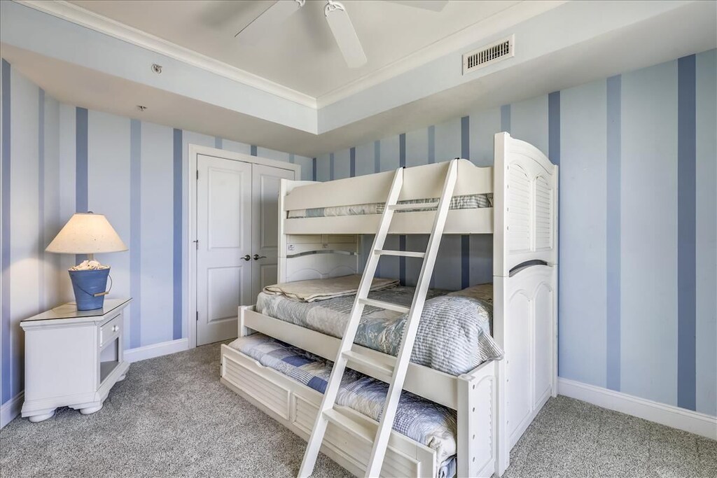 Bedroom 3 is perfect for your little loved ones, with a Pyramid Bunk and Twin Trundle.