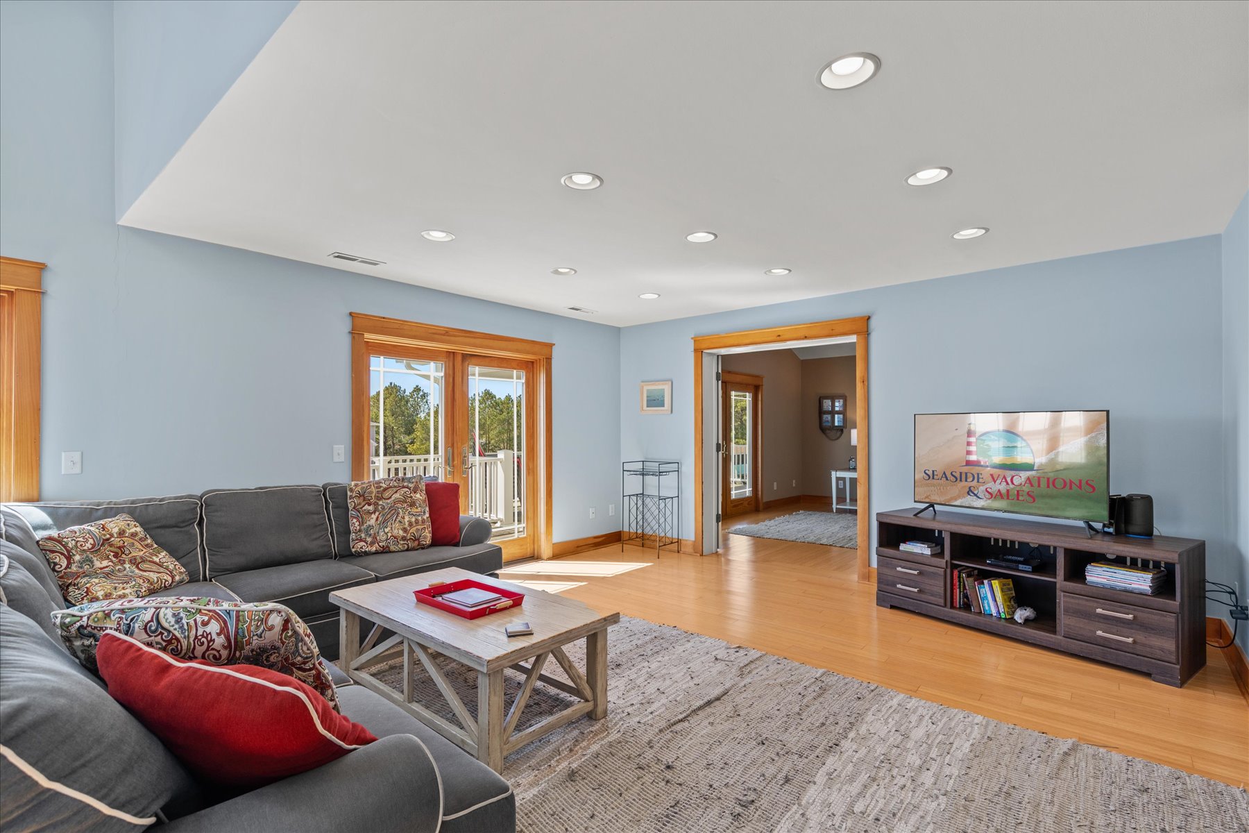 Serene Coastal Colors and gorgeous Hardwood Flooring.
