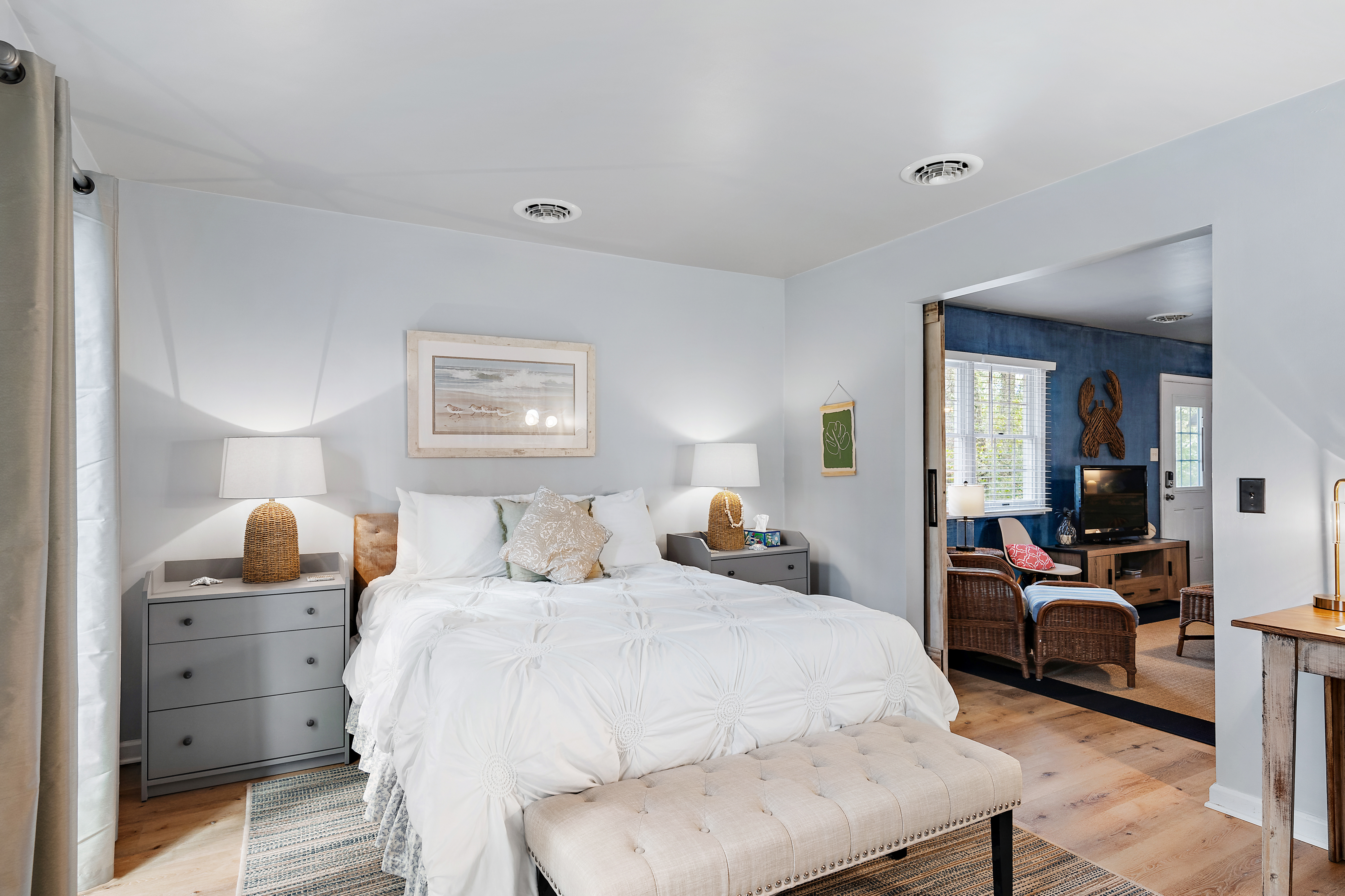 Master Bedroom is adorned in Crisp Whites and has a Queen Bed.