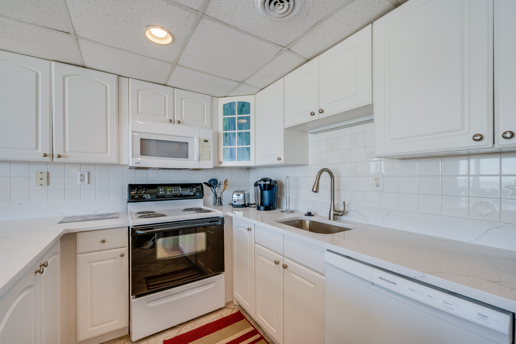 They will love the fully equipped kitchen and the white open area!