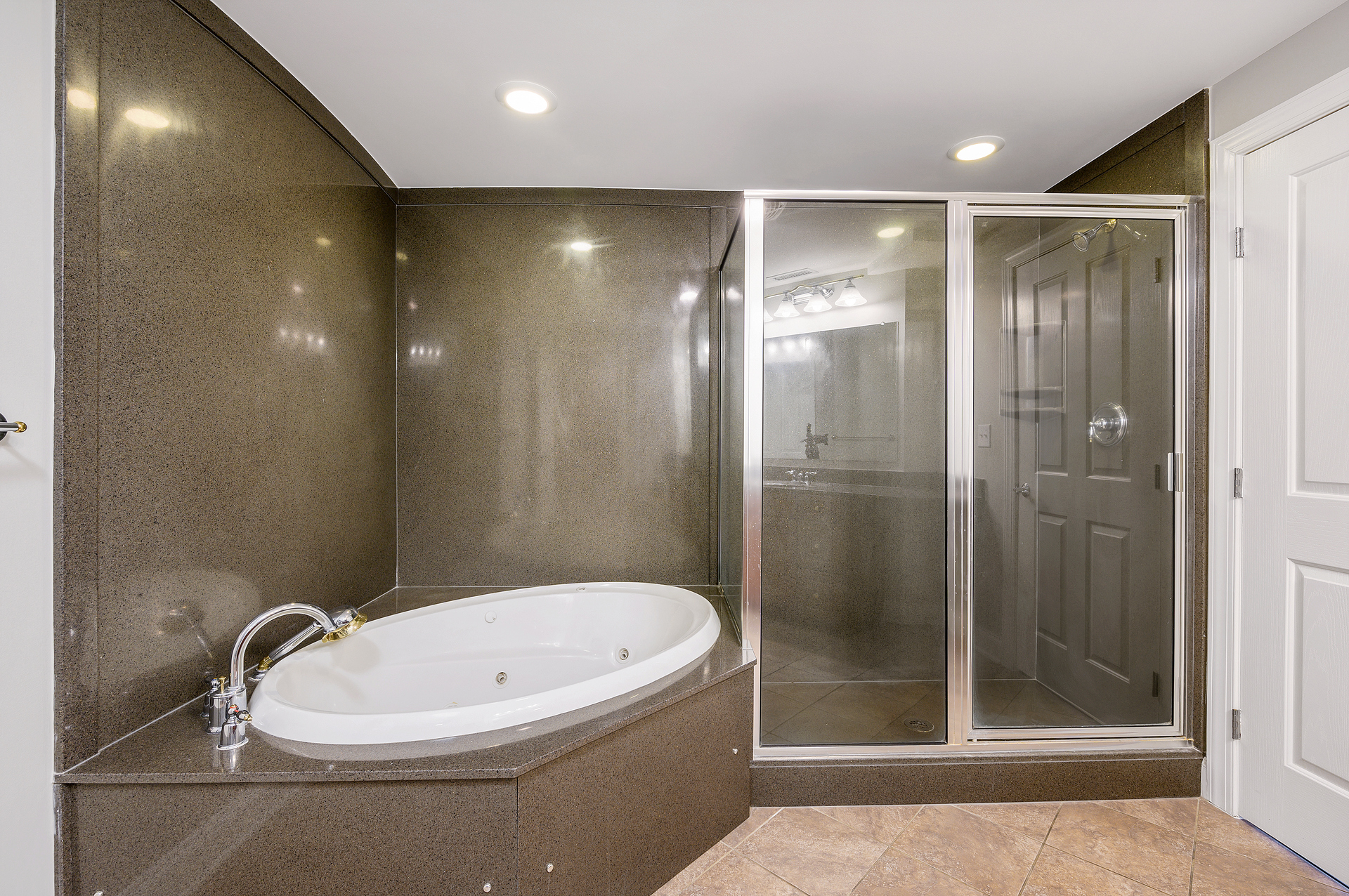 Enjoy the soaking tub or wash off the day in the Standing Shower.