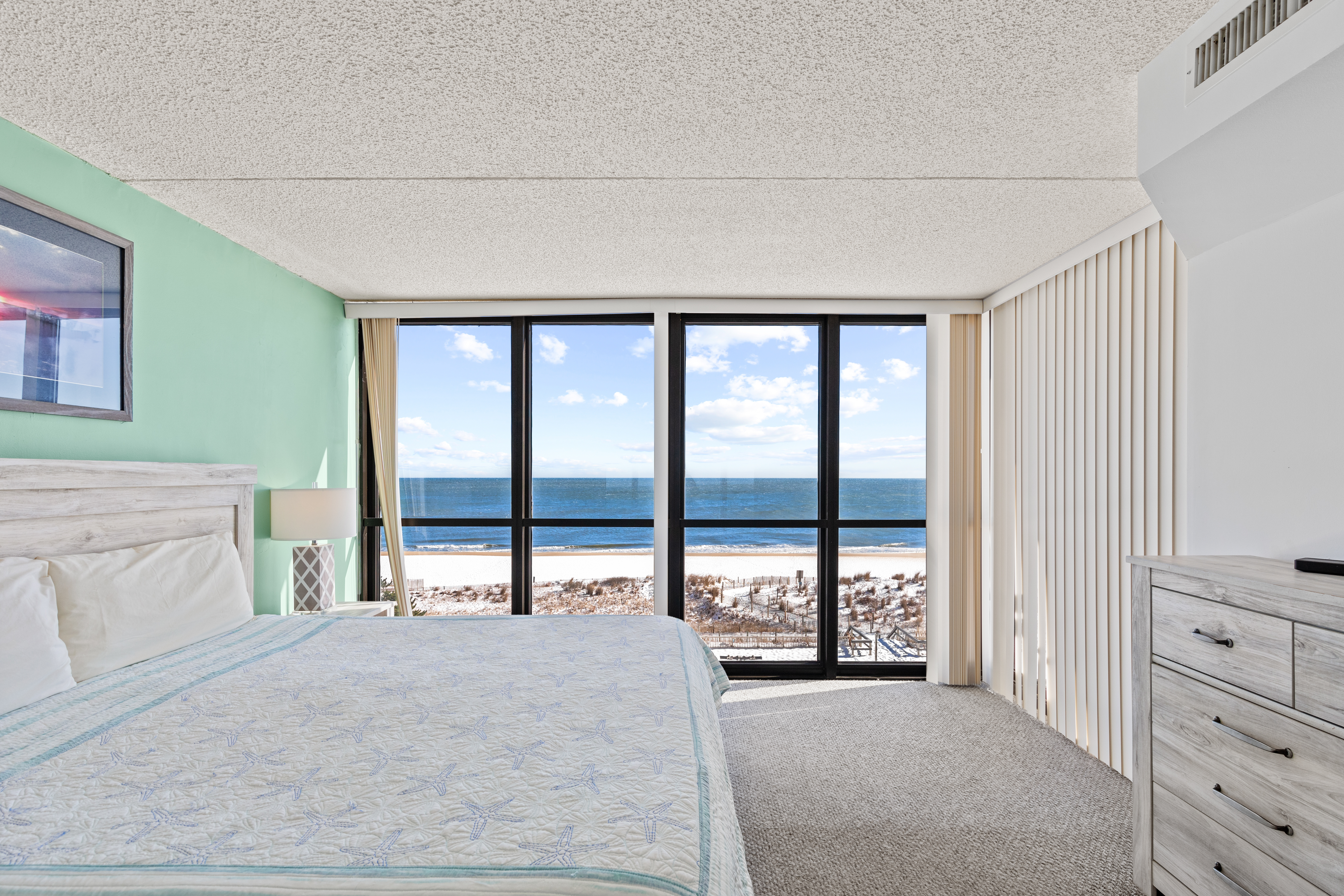 With Glorious Floor to Ceiling Windows, you may never want to leave the bed!