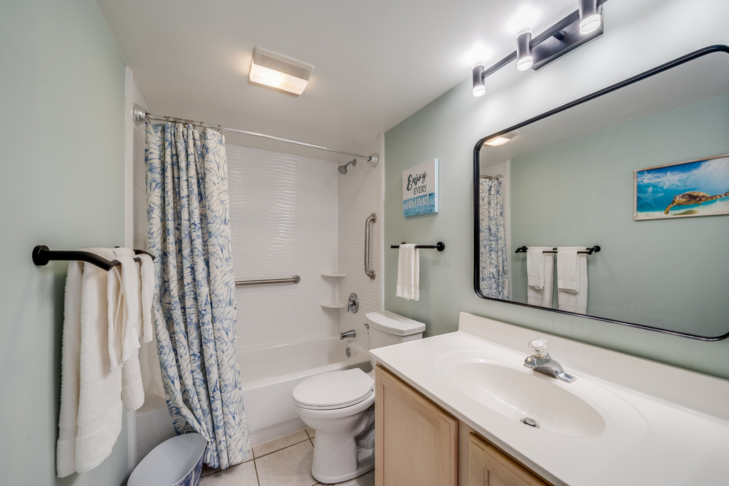 A clean, bright bathroom with modern fixtures and everything you need to freshen up.