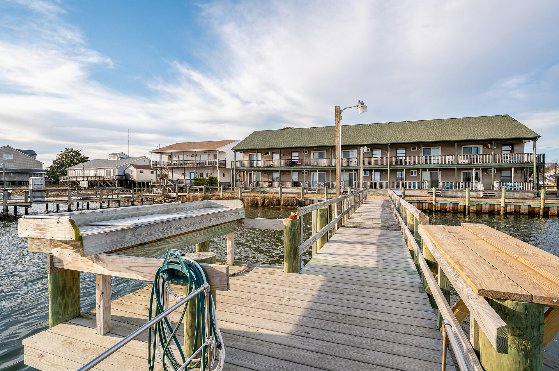 Community Pier with Fish Cleaning Table and Water.