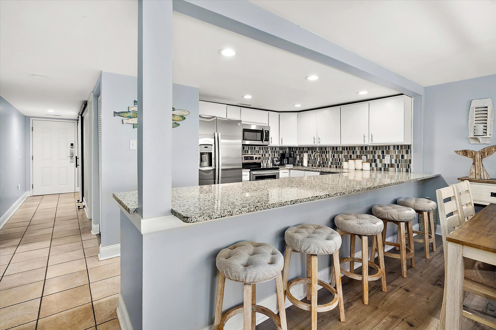 Pull up a stool at the kitchen counter for morning coffee or a casual evening cocktail.
