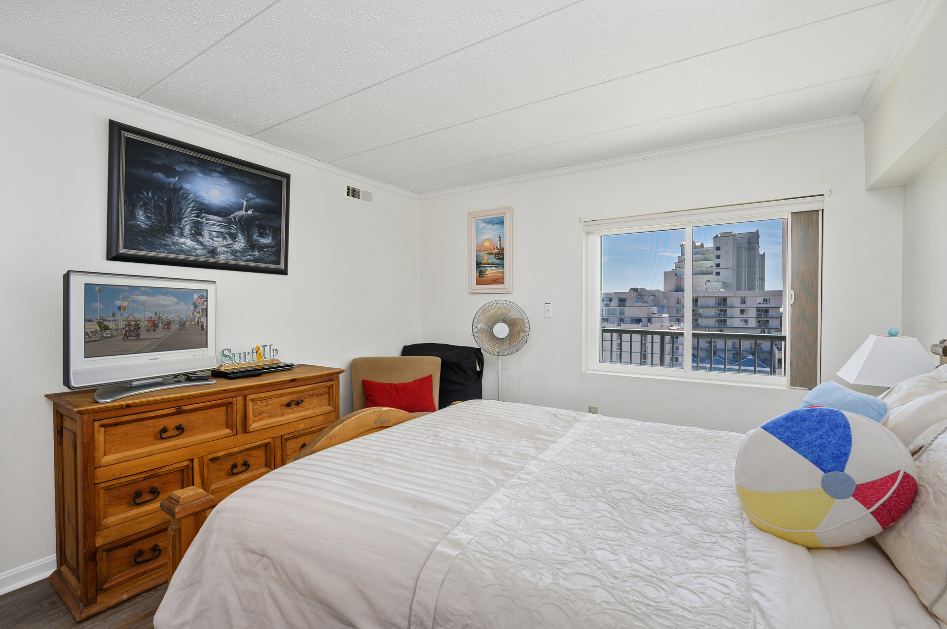 Plush Queen Bed, Flat Screen TV and stellar Bay Views are on Deck for Bedroom 2.
