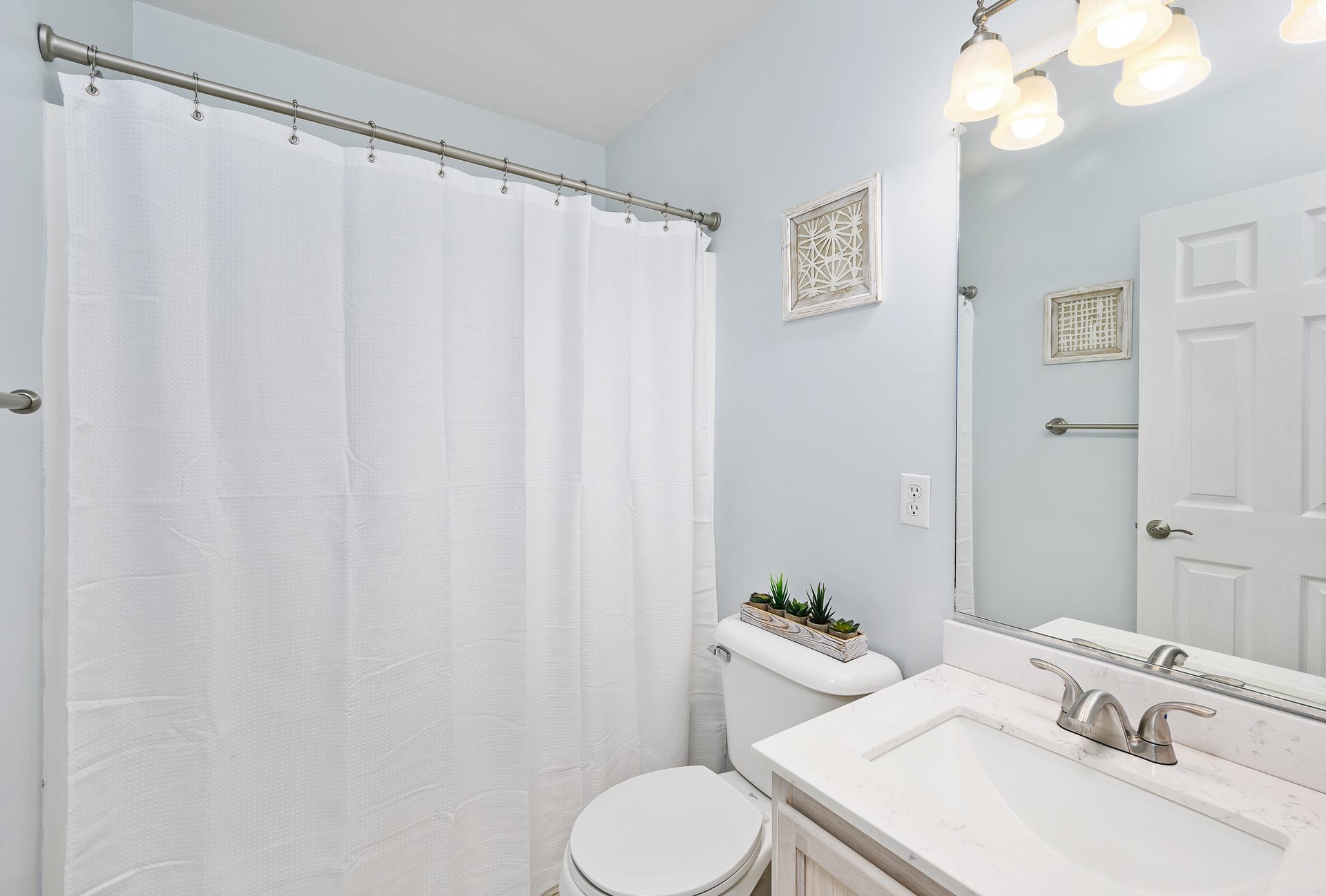 Bedrooms 2 and 3 shared Full Bath has a shower/tub condo