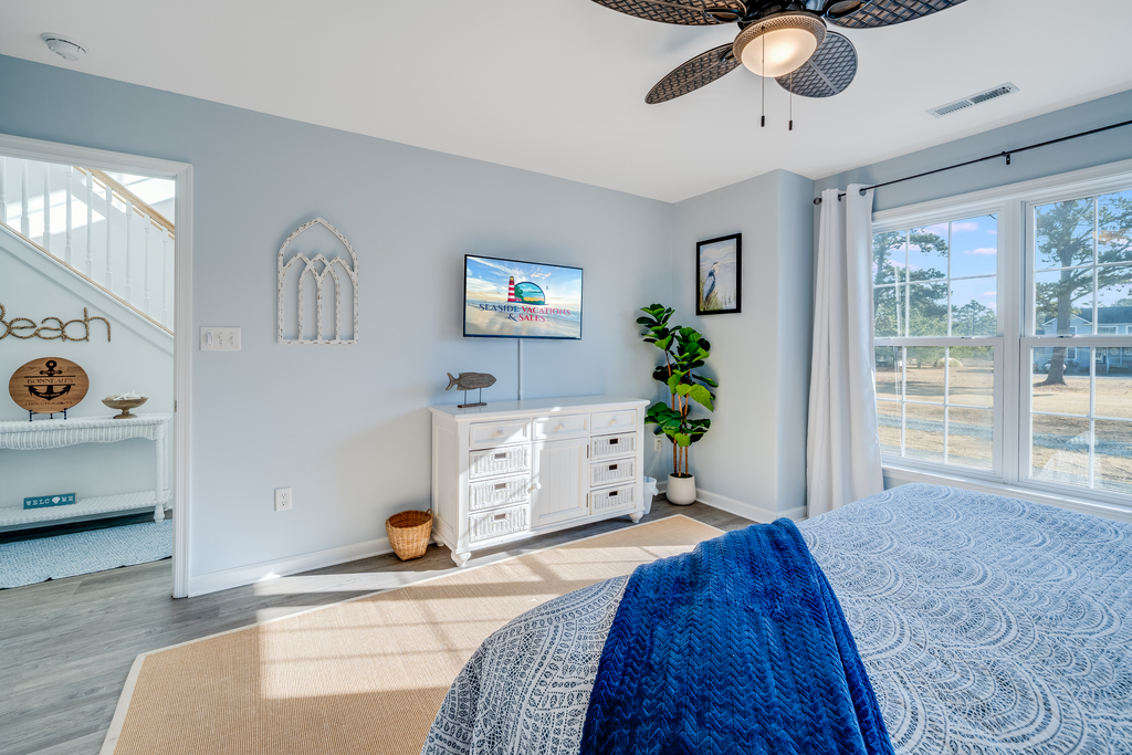 Flat Screen Smart TV in Primary Bedroom.