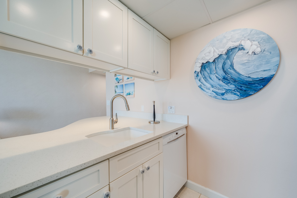 Clean, modern finishes and coastal accents make this kitchen feel like a true getaway.