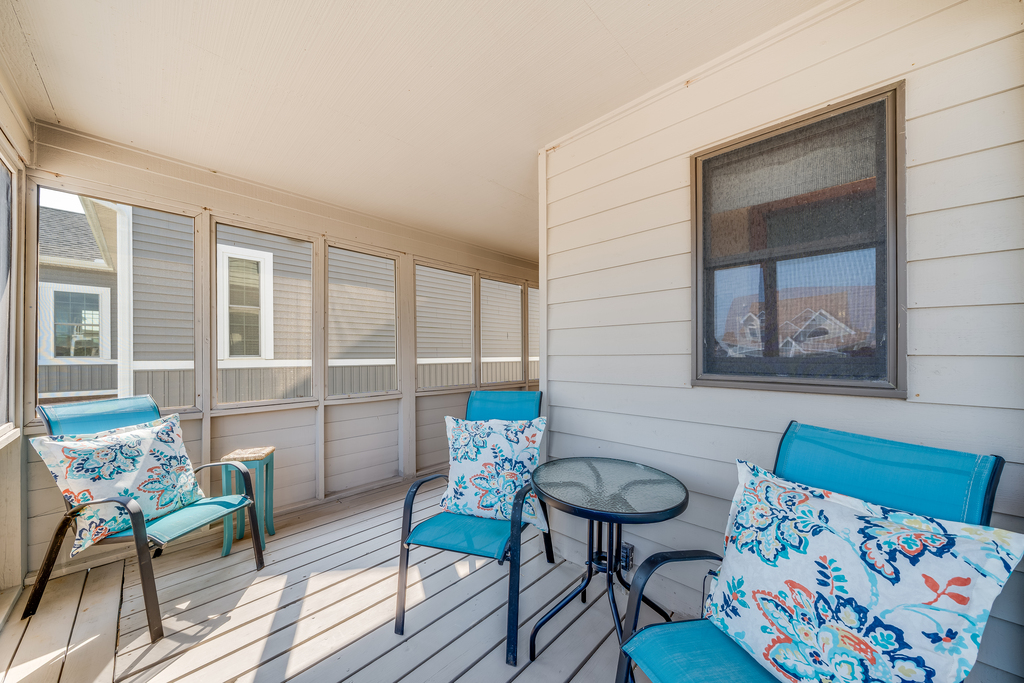 Enjoy your morning coffee on the Canalfront Screened Porch.