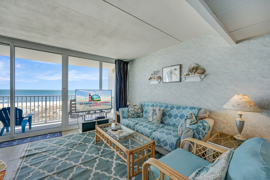 The Living Area, adorned in cool, calming blues, is a welcoming retreat after a fun-filled day on the Beach or in the Seasonal Outdoor Pool.