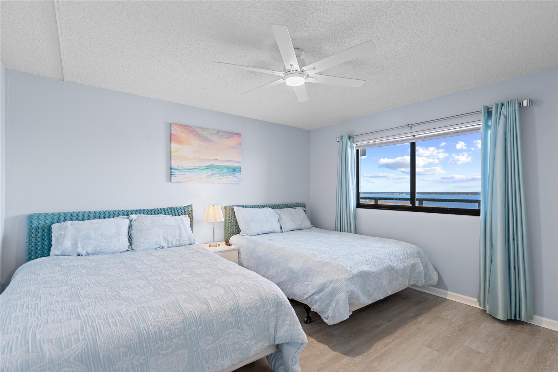 Bedroom 2 will comfortably sleep up to 4 with 2 Queen beds and a great bay view.