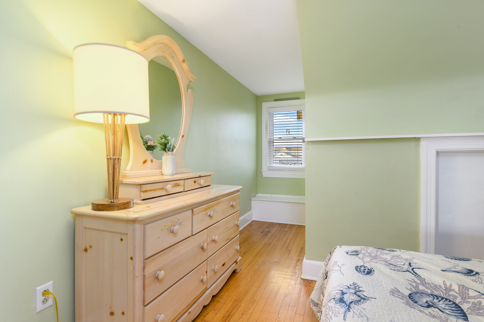 Beautifully decorated the bedroom offers a peaceful serene space