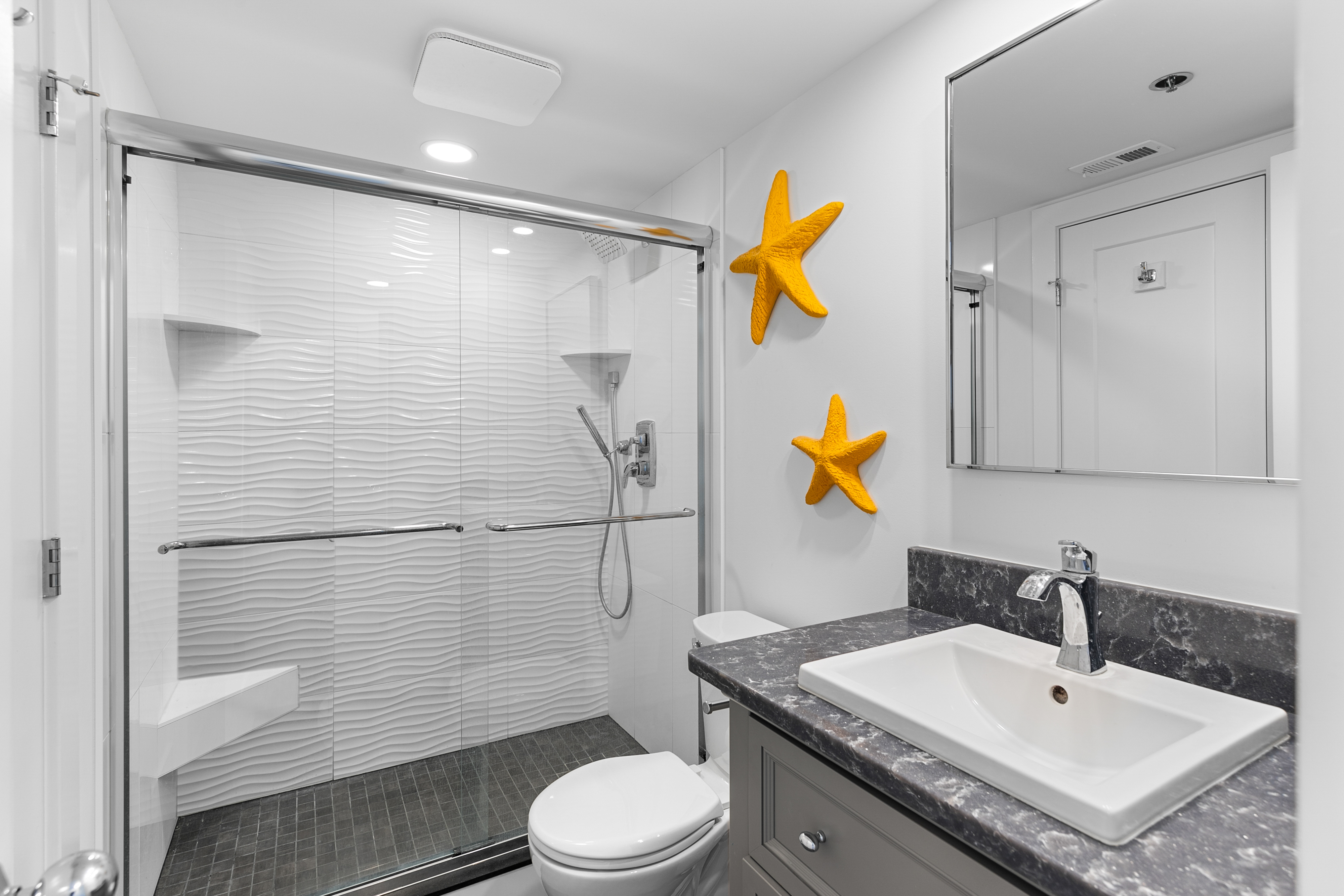 The 2nd Full Bath is convenient to both the Living Area and Bedrooms, and has a Shower/Tub Combo.
