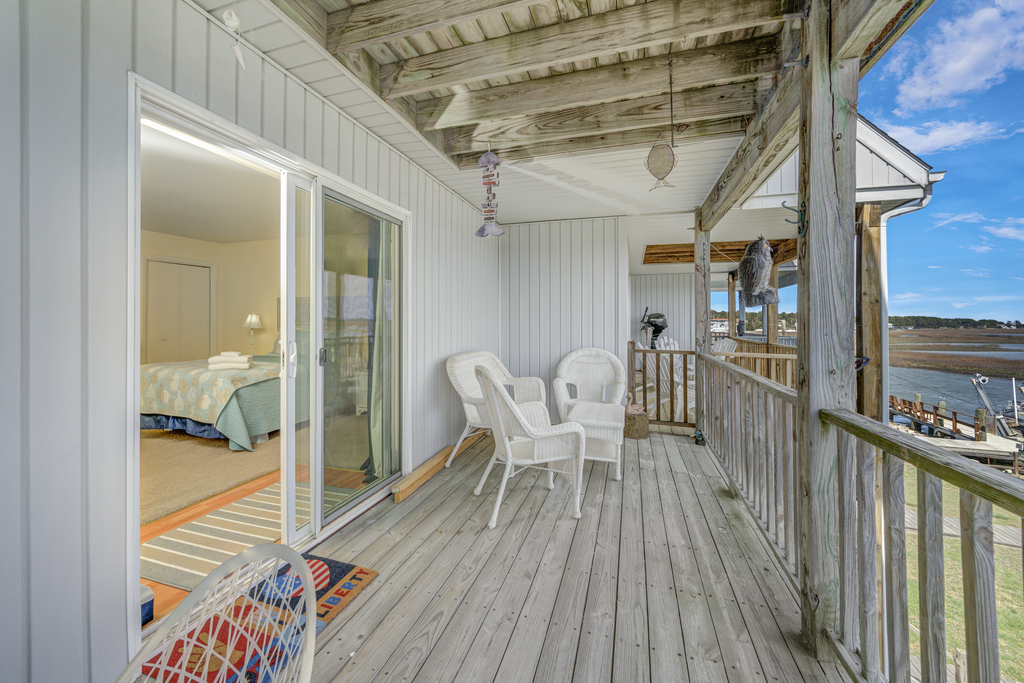 Slip out to sip your morning coffee and watch Herons and Egrets fish for their morning meal.