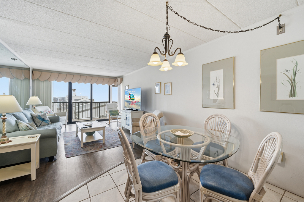 There is plenty of space for meals in with seating at the dining table as well as the breakfast bar