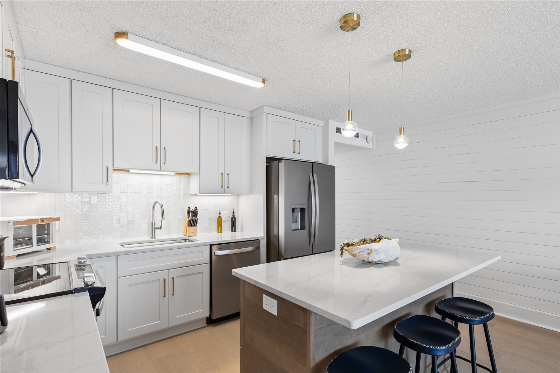 Beautiful white cabinets and updated stainless steal appliances.