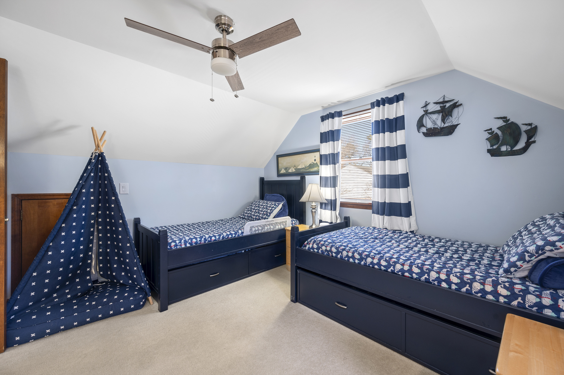 Bedroom 3 sleeps 4 and we love the Nautical Navy and White.