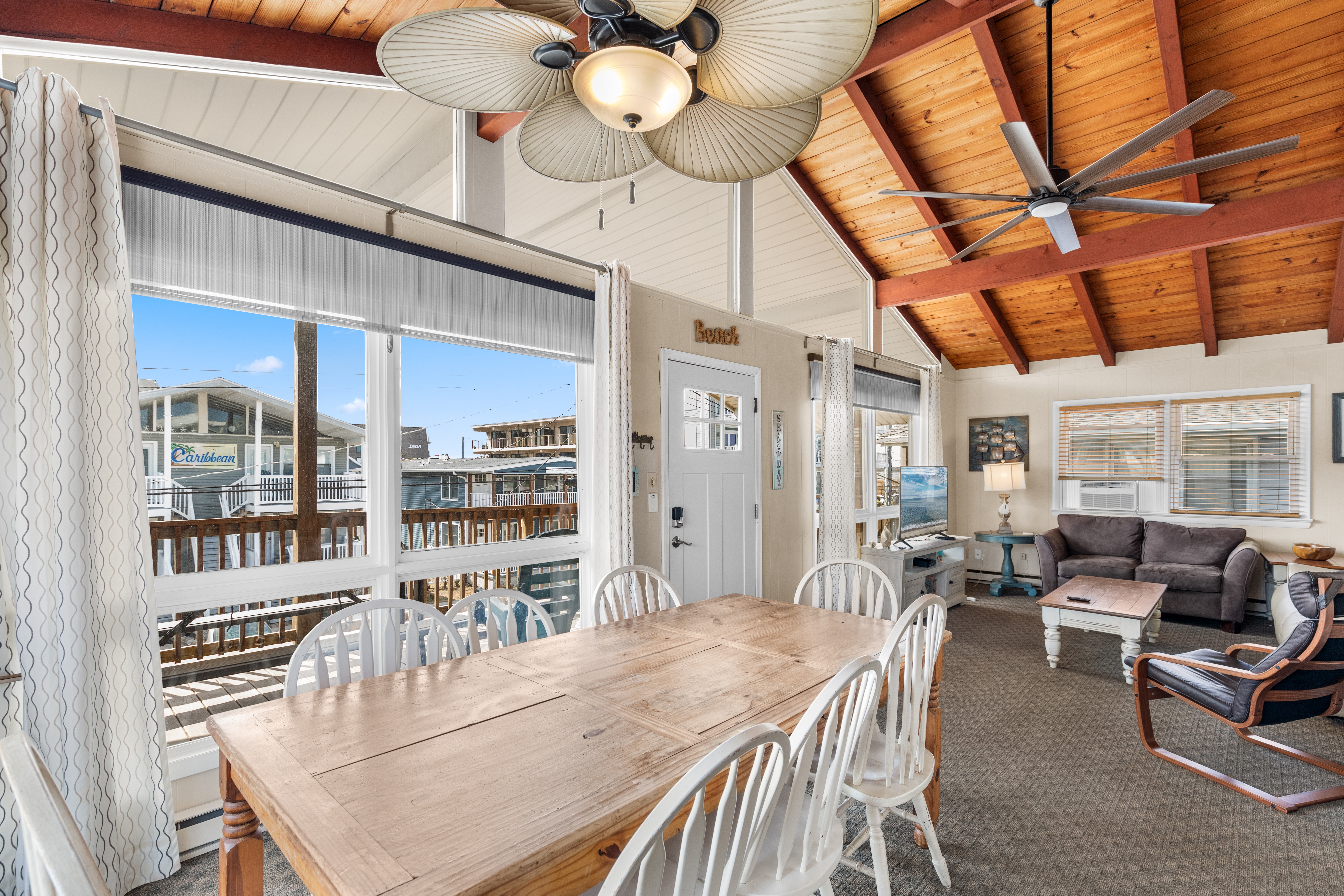 Just off the Kitchen is the open Dining Area, comfortably seating 8!