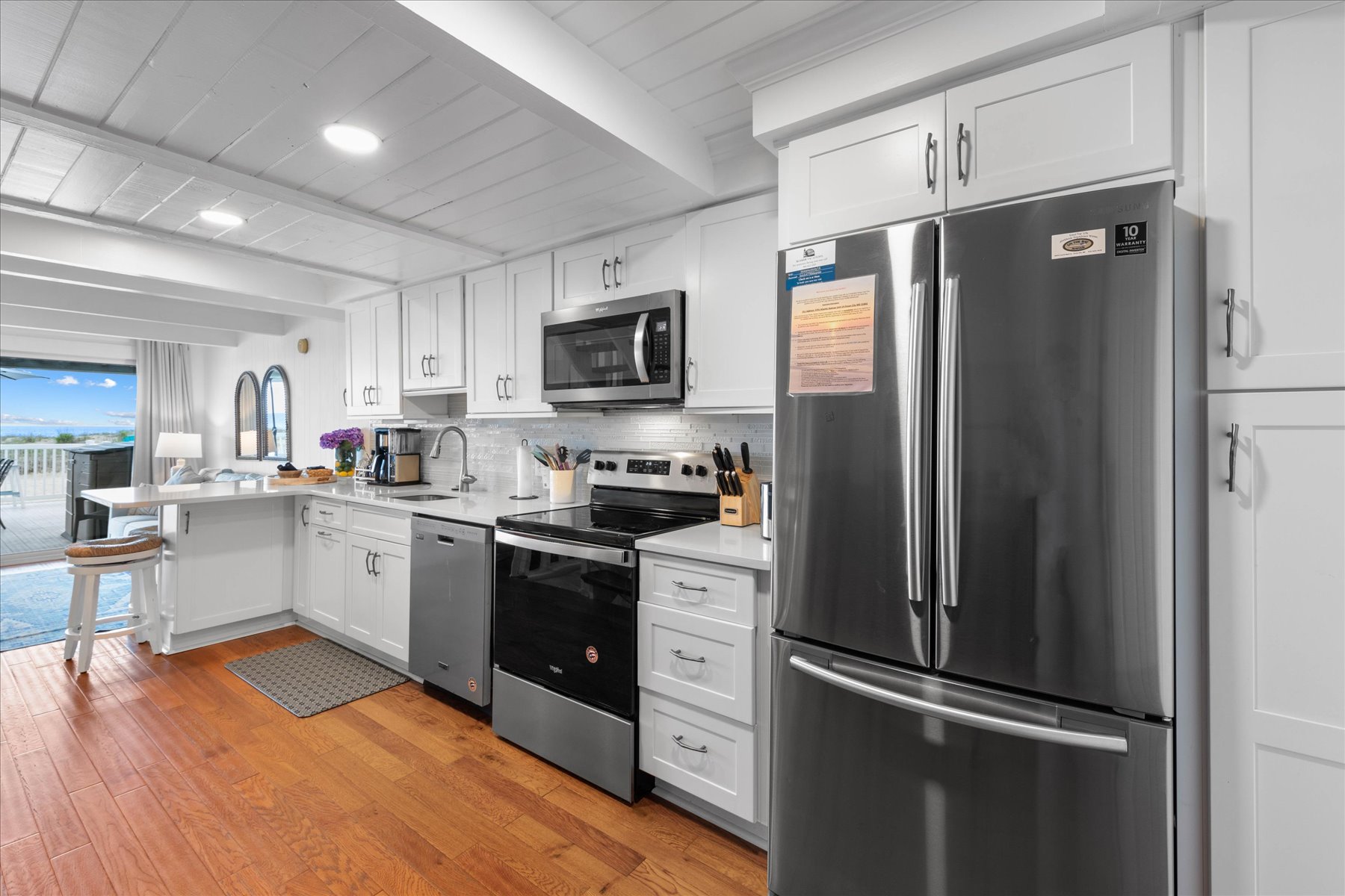 This spacious kitchen is located just off the living room.