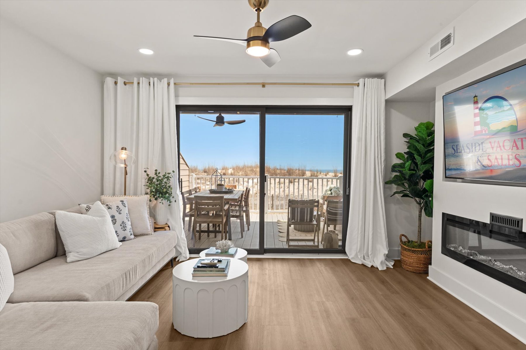 Sunlit living room with contemporary coastal design