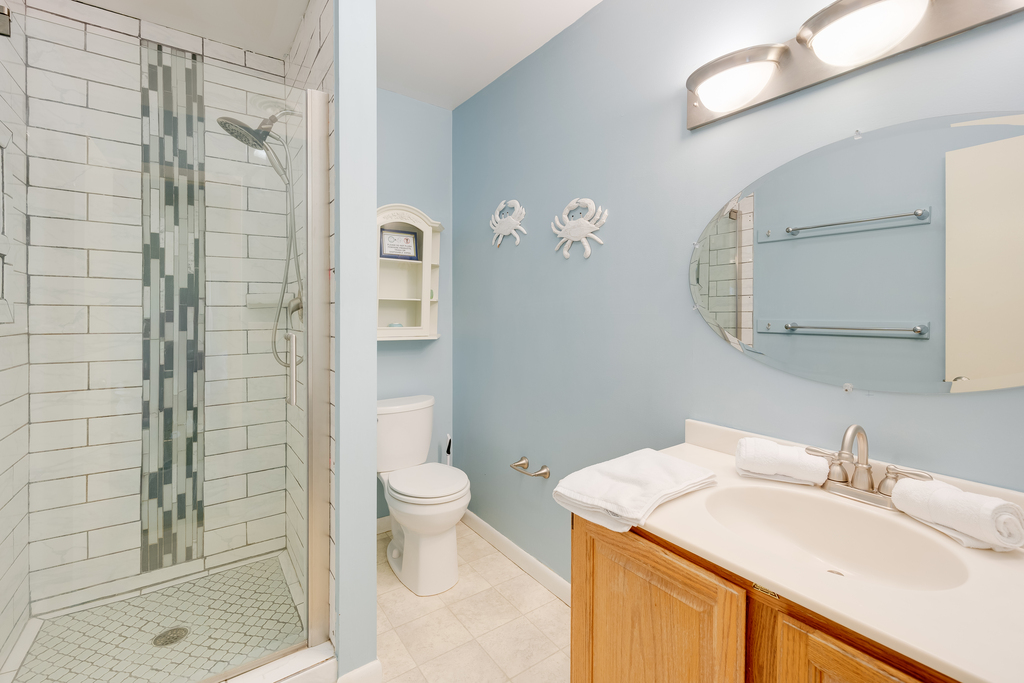 Full Bath 2 is attached to Bedroom 3 and has a Walk-in Shower.
