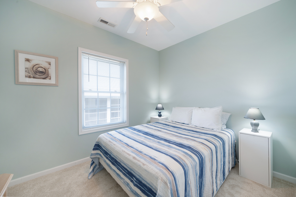 Bedroom 2 is Light, Bright & Beachy!