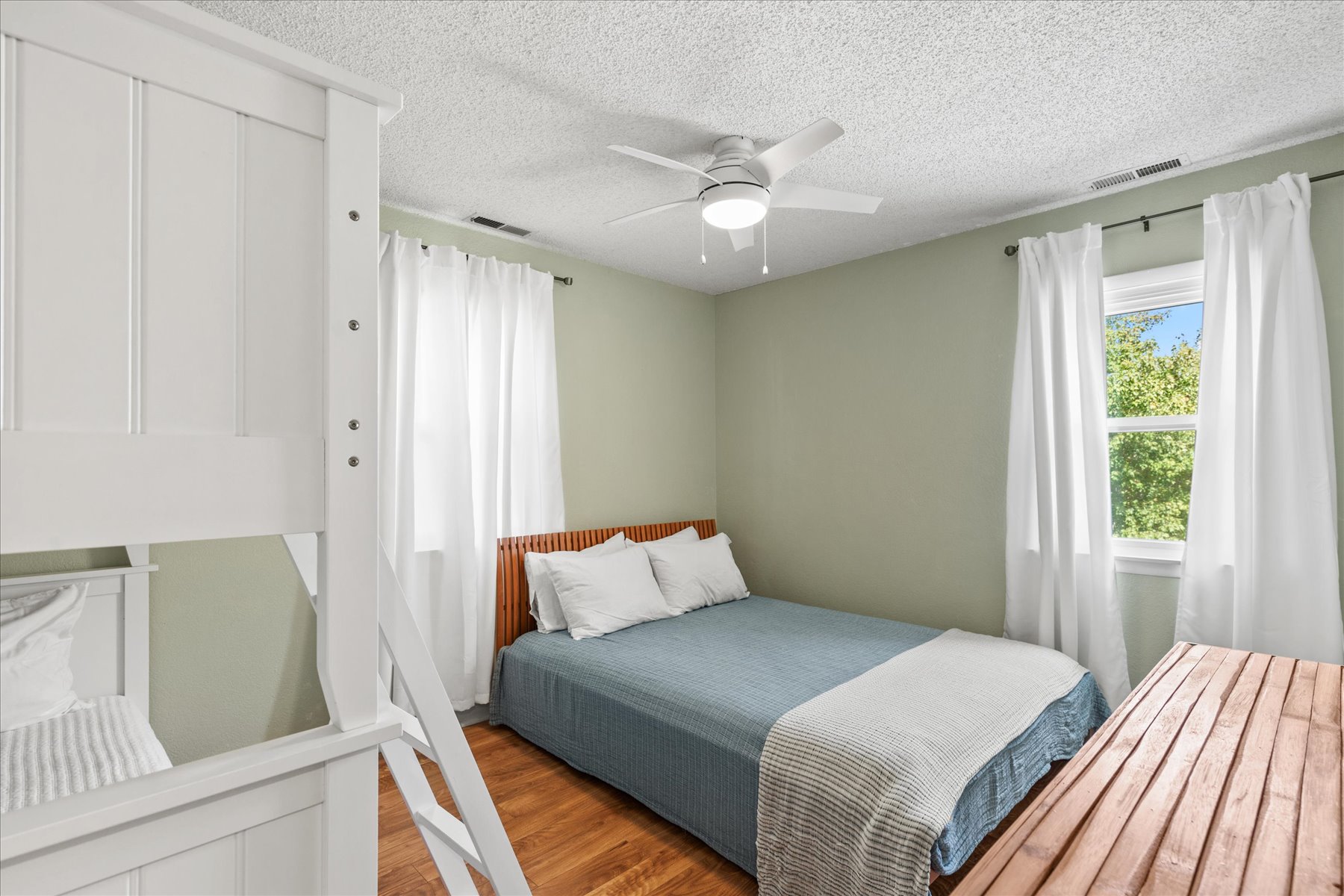 With 1 Full Bed and a Twin Bunk Bed.