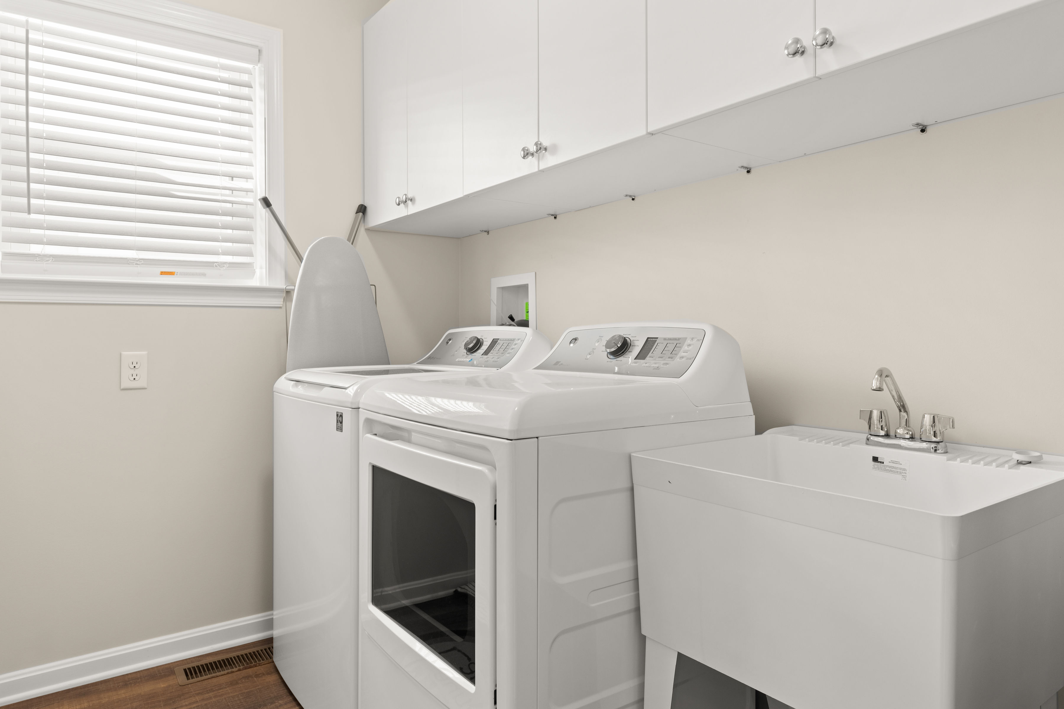Full Laundry Room with Washer, Dryer & Sink!