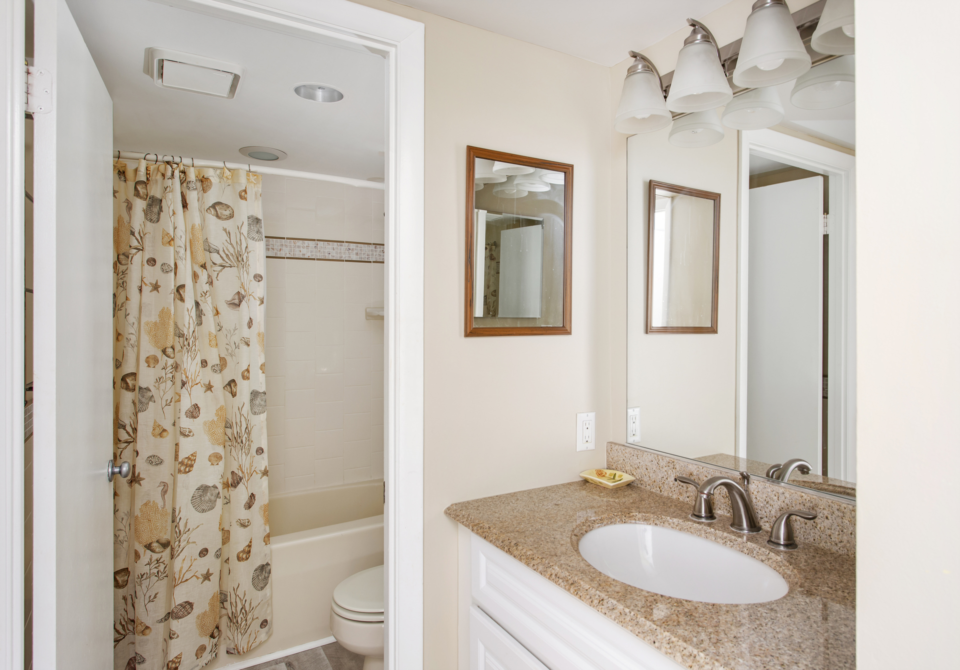 Shared bathroom in hall, near Bedroom 2.