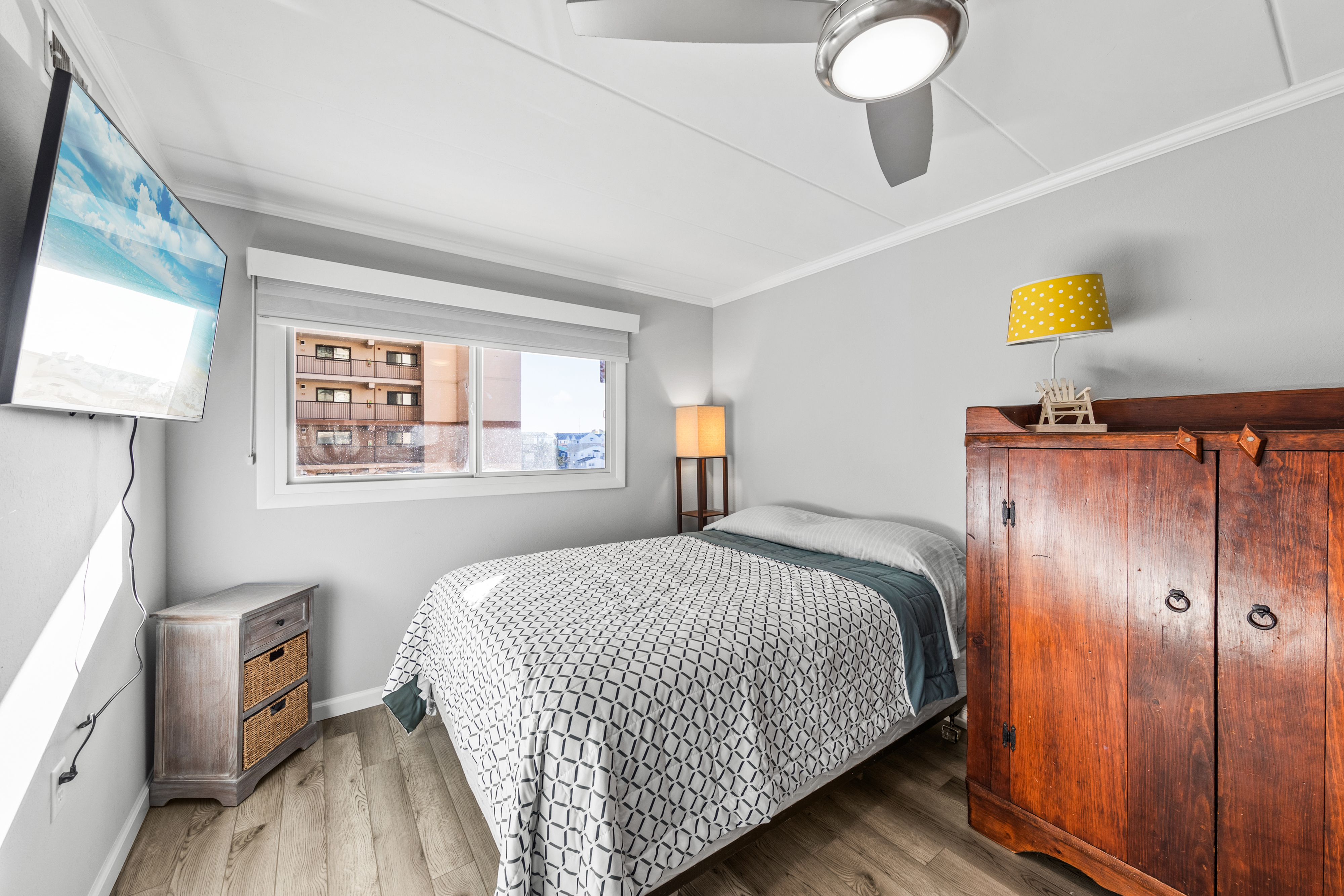 Comfortable queen size bed in the second bedroom.