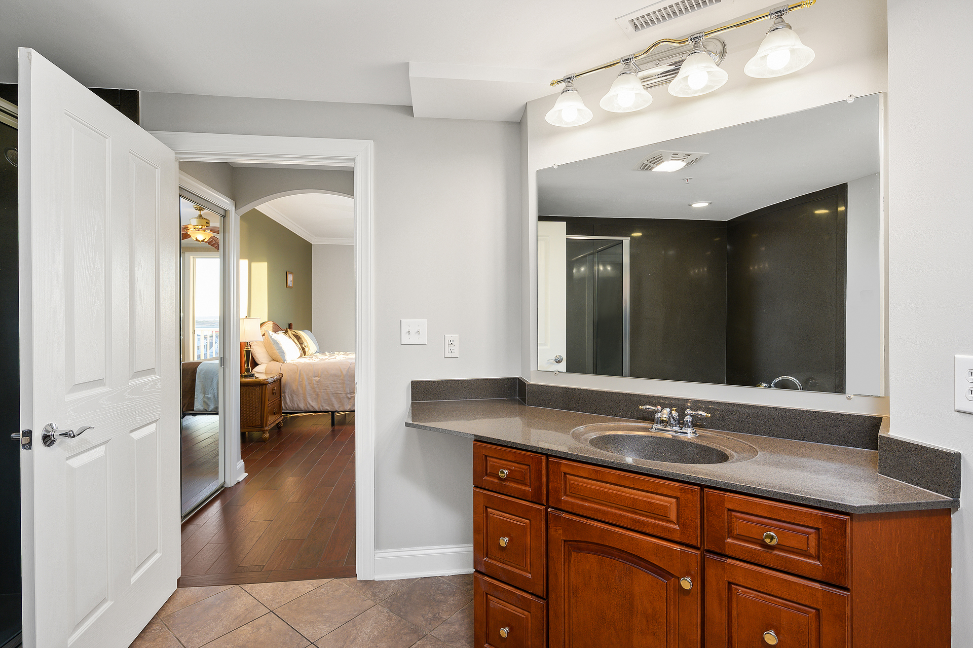 Large counter space is also found in the bathroom.