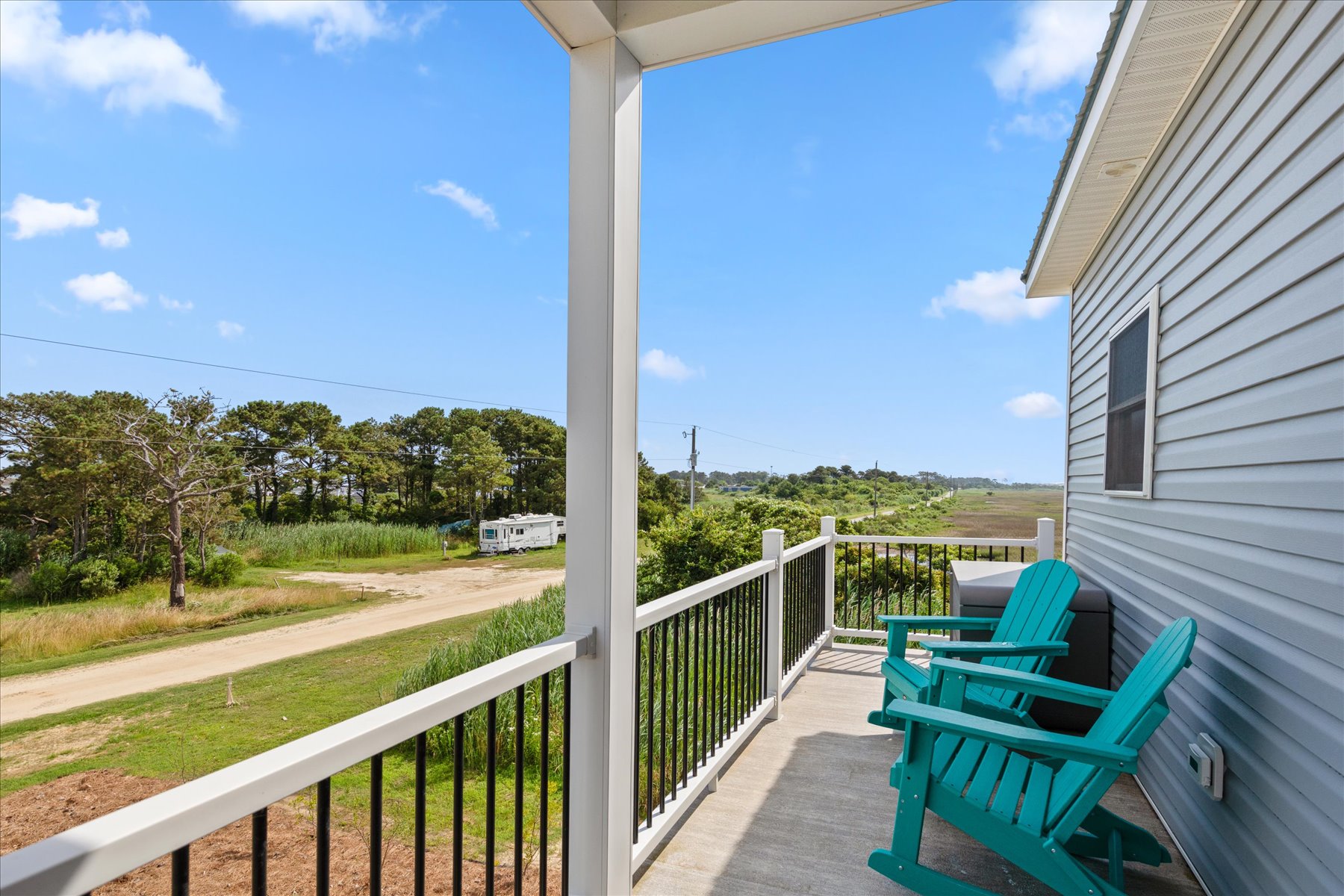 Enjoy some quiet time in the beachy Rockers.