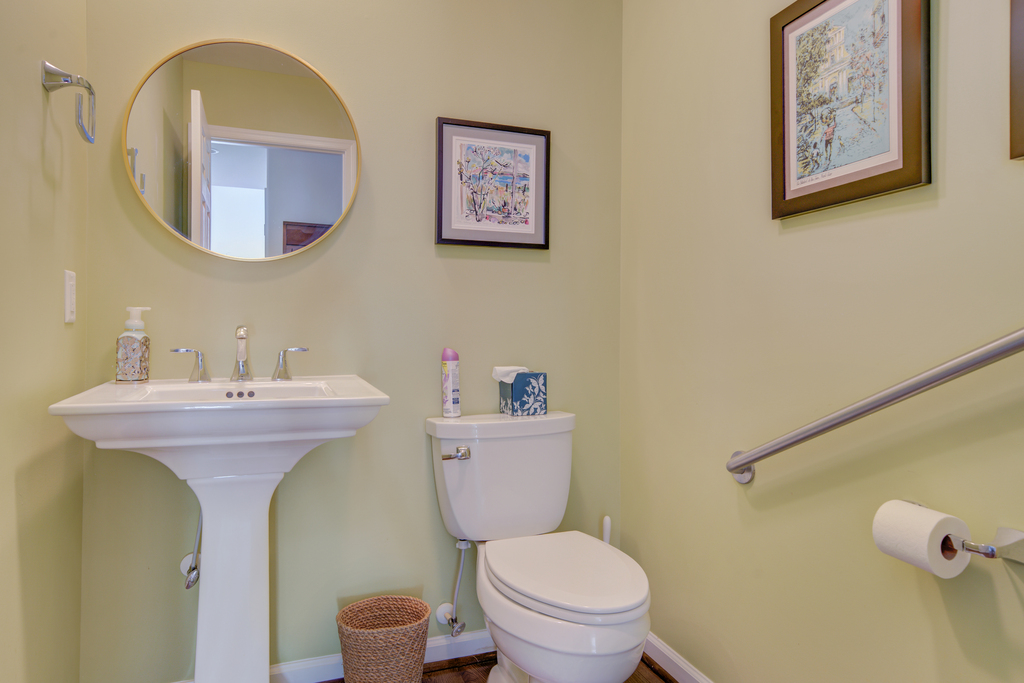 Down the hall you'll find a Half Bathroom